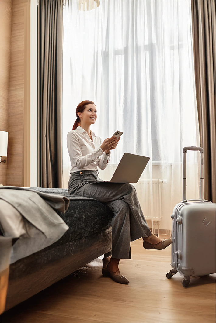 Business professional staying connected with ONE Pocket WiFi during meetings and travel.